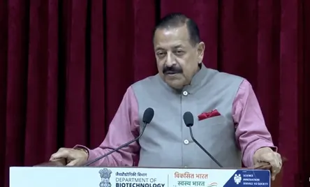 Dr. Jitendra Singh at a lectern with Department of Biotechnology branding